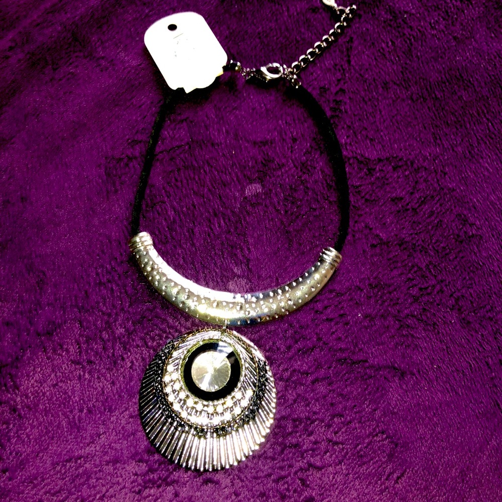 Silver necklace with round pendant